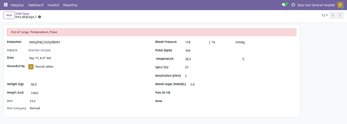 Vital signs record with an out of range warning banner and calculated BMI