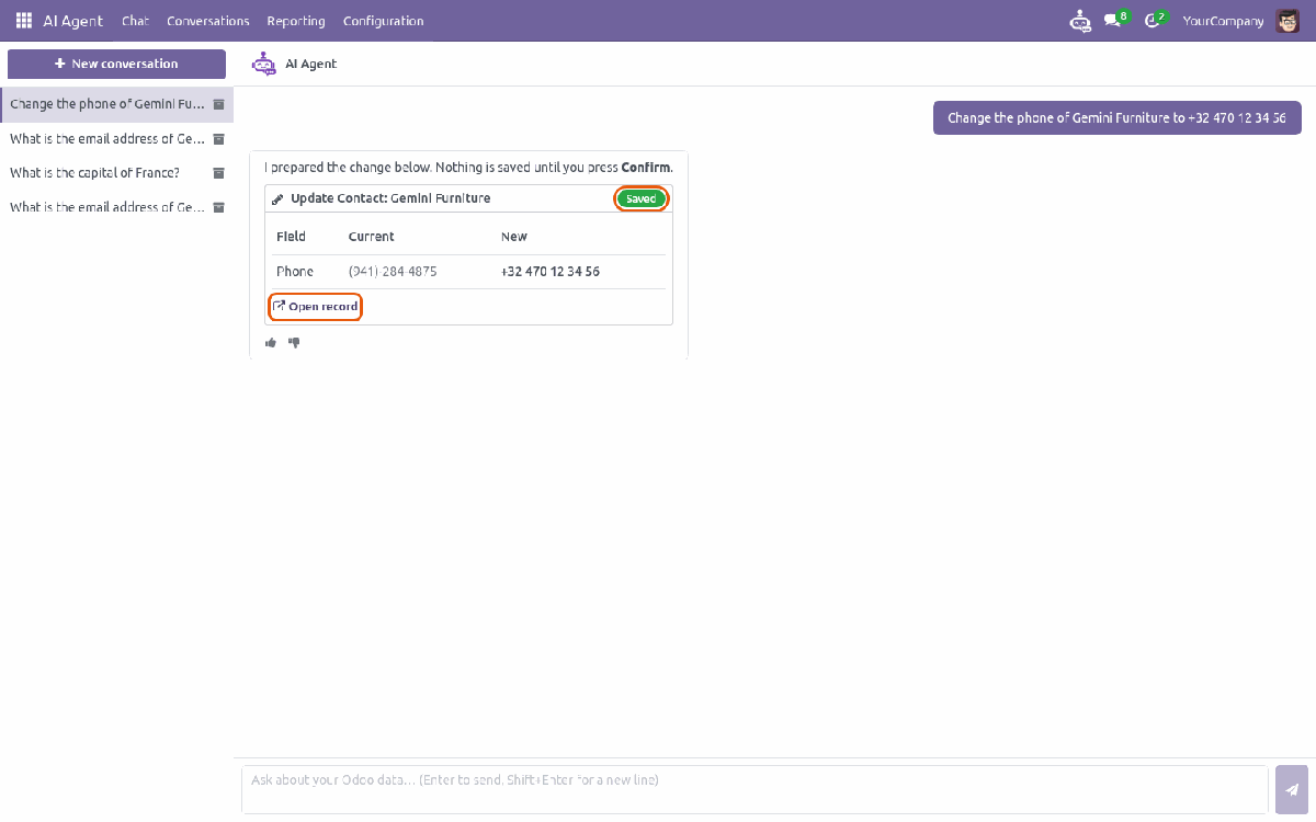 The same change card after confirmation with a Saved badge and Open record link